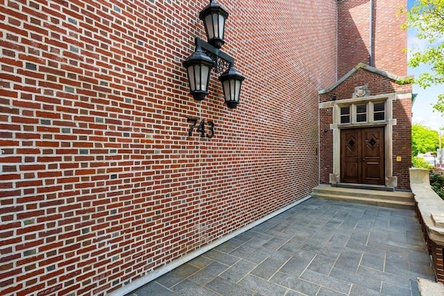 743 E 4th Unit 204, Boston, MA 02127 - view of exterior entry with brick siding