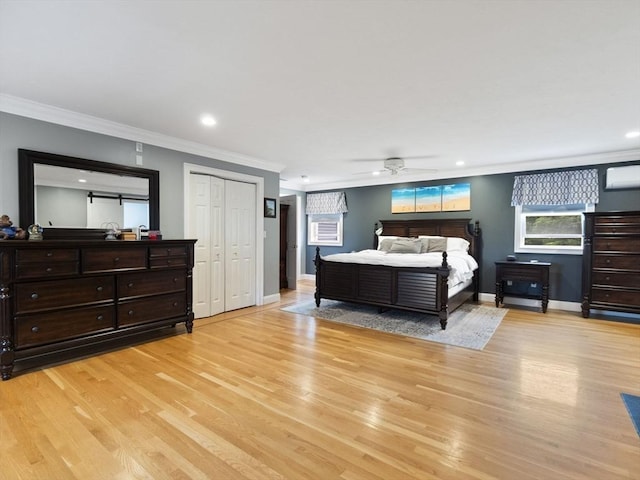 886 Methuen St, Dracut, MA 01826 - bedroom featuring crown molding, light wood-type flooring, a wall mounted AC, recessed lighting, and ceiling fan