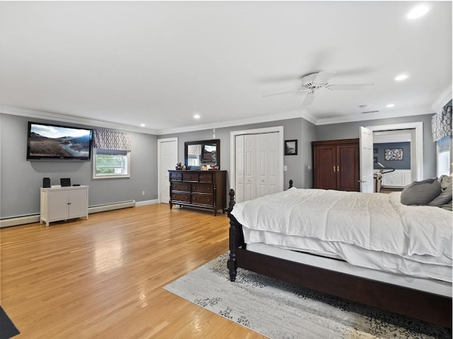 886 Methuen St, Dracut, MA 01826 - bedroom featuring a baseboard radiator, recessed lighting, light wood-type flooring, ornamental molding, and multiple closets