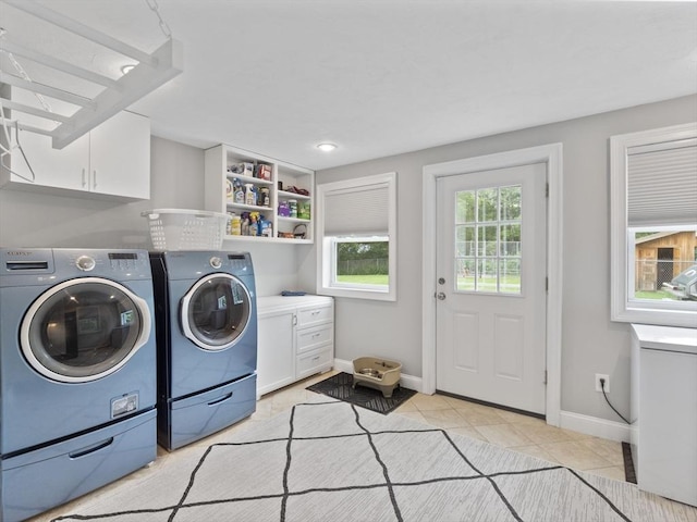 886 Methuen St, Dracut, MA 01826 - laundry area with washer and dryer, cabinet space, and light tile patterned floors