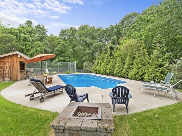 886 Methuen St, Dracut, MA 01826 - view of pool with an outdoor fire pit, a patio, and a shed