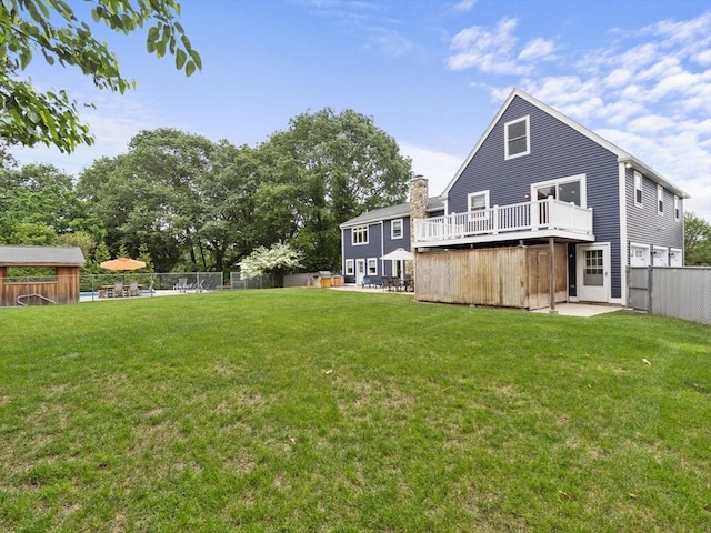 886 Methuen St, Dracut, MA 01826 - back of house with a chimney and a deck