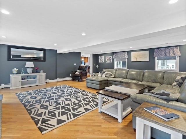 886 Methuen St, Dracut, MA 01826 - living room with a baseboard heating unit, a baseboard radiator, wood finished floors, and recessed lighting