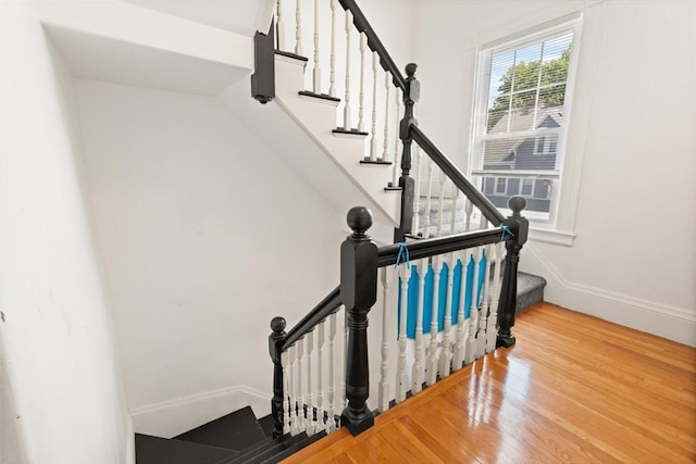 23 Gordon St, Boston, MA 02134 - stairway featuring wood finished floors and baseboards