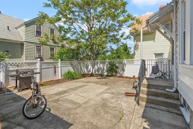 23 Gordon St, Boston, MA 02134 - fenced backyard featuring area for grilling and a patio