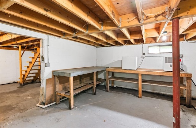 24 Horton Rd, Orange, MA 01364 - basement featuring a workshop area and stairway