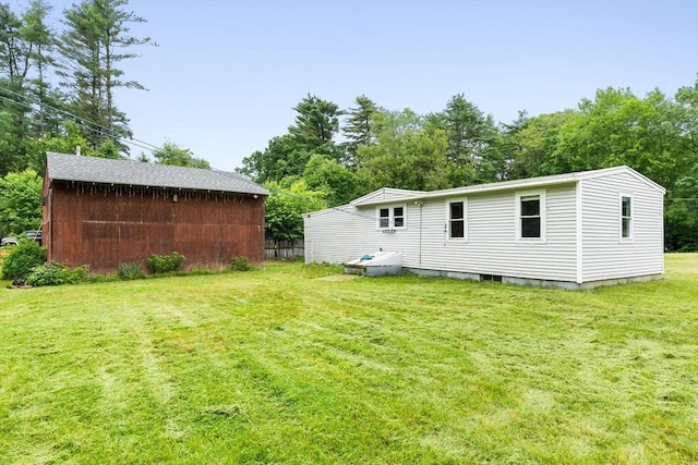 24 Horton Rd, Orange, MA 01364 - view of grassy yard featuring view of wooded area