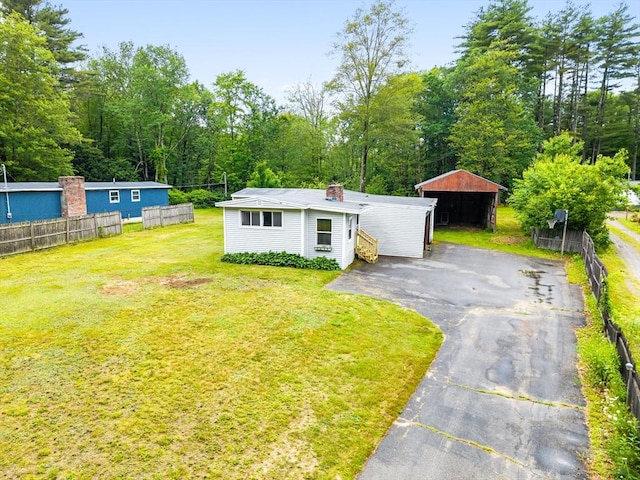 24 Horton Rd, Orange, MA 01364 - view of front of house with a detached carport and driveway