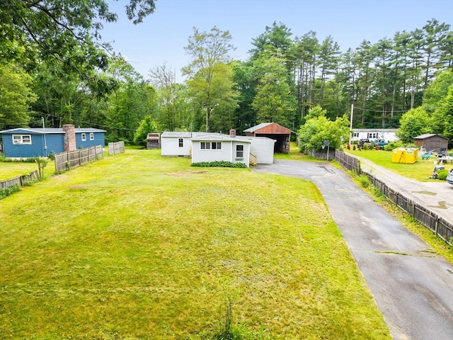 24 Horton Rd, Orange, MA 01364 - view of front of house with driveway and view of scattered trees