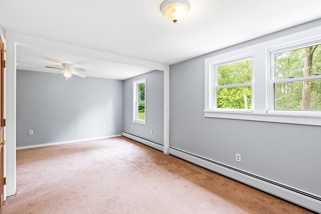 24 Horton Rd, Orange, MA 01364 - unfurnished room with a baseboard radiator, light carpet, and a ceiling fan
