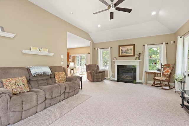 1 Windsor Rd, Shirley, MA 01464 - living room with ceiling fan, healthy amount of natural light, a fireplace with flush hearth, carpet flooring, and lofted ceiling