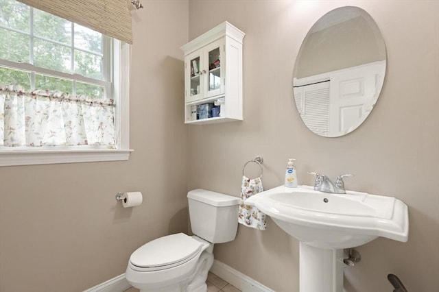 1 Windsor Rd, Shirley, MA 01464 - half bath with baseboards and tile patterned flooring