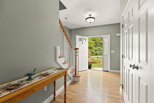 1 Windsor Rd, Shirley, MA 01464 - entrance foyer featuring light wood-style flooring and stairs