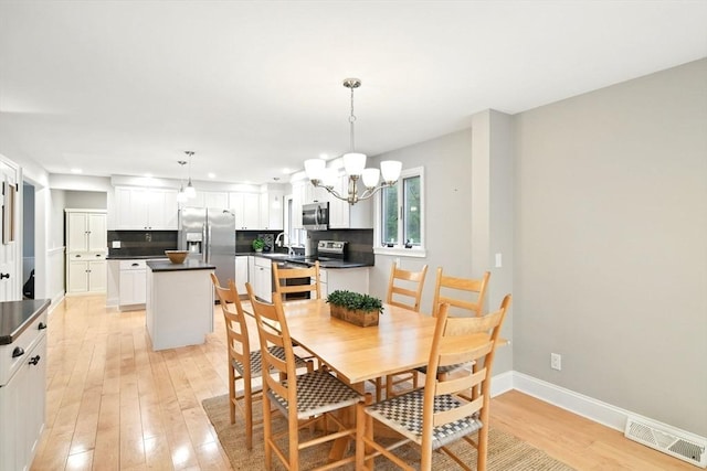 3 Pine Knl, Southwick, MA 01077 - dining area featuring a chandelier, light wood-style floors, baseboards, and recessed lighting