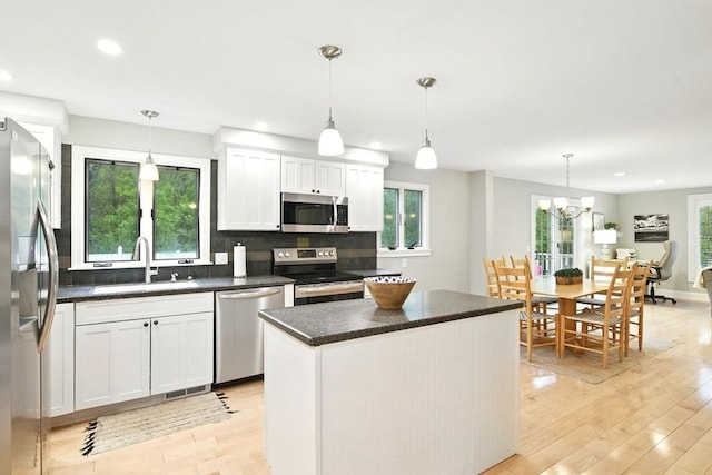 3 Pine Knl, Southwick, MA 01077 - kitchen featuring stainless steel appliances, a sink, light wood-style floors, recessed lighting, and white cabinets