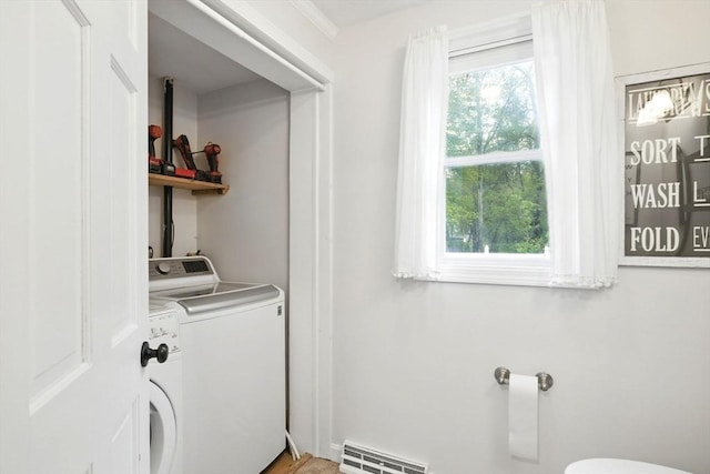 3 Pine Knl, Southwick, MA 01077 - laundry room with washer and dryer and healthy amount of natural light