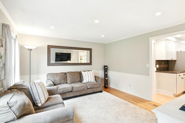 3 Pine Knl, Southwick, MA 01077 - living area with a wainscoted wall, light wood-type flooring, ornamental molding, and recessed lighting