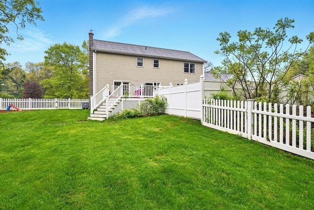 3 Pine Knl, Southwick, MA 01077 - rear view of house featuring a chimney, a wooden deck, and stairs