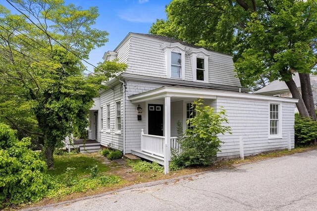 6 Parker Ave, Cohasset, MA 02025 - second empire-style home with covered porch and mansard roof