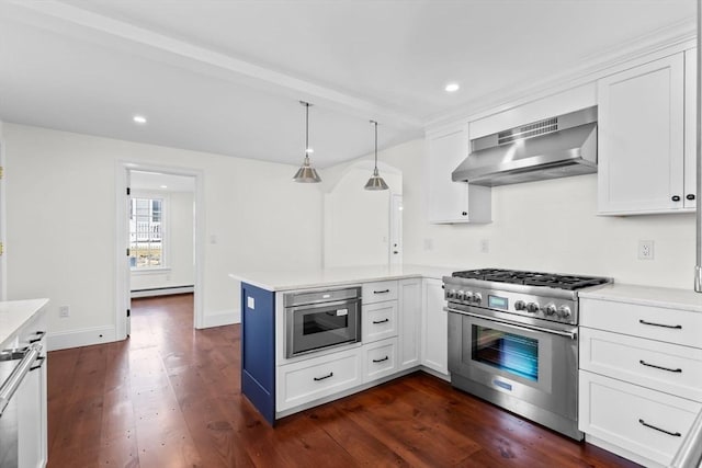 6 Parker Ave, Cohasset, MA 02025 - kitchen featuring appliances with stainless steel finishes, wall chimney range hood, white cabinets, and recessed lighting