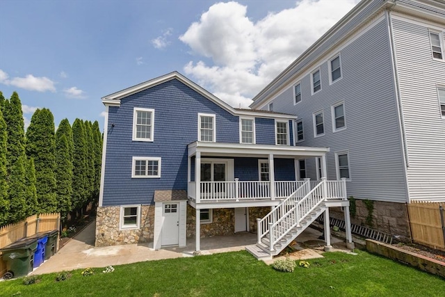247 Pitman St, Fall River, MA 02723 - back of property with a patio area and stairway