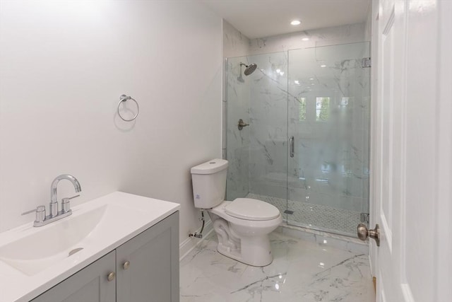 247 Pitman St, Fall River, MA 02723 - bathroom with a marble finish shower, marble finish flooring, toilet, vanity, and baseboards