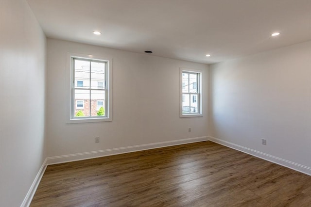247 Pitman St, Fall River, MA 02723 - spare room featuring plenty of natural light, dark wood-style flooring, recessed lighting, and baseboards