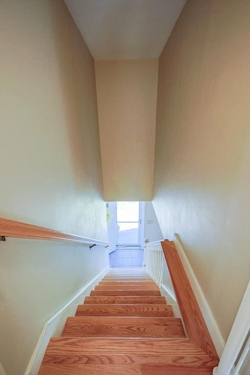 stairs featuring baseboards