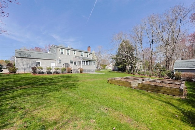 view of yard featuring a garden
