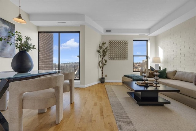 living room with light hardwood / wood-style flooring