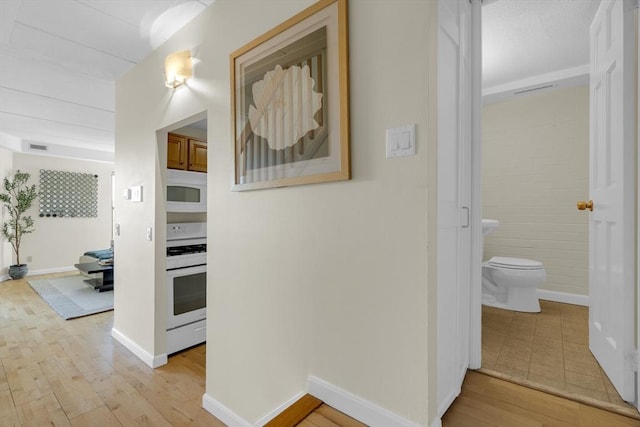 hall featuring light hardwood / wood-style floors