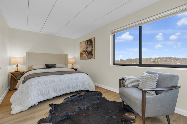 bedroom featuring hardwood / wood-style floors