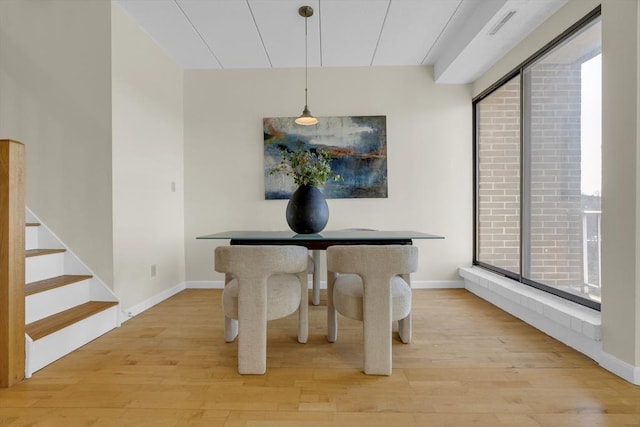 dining space featuring light hardwood / wood-style flooring