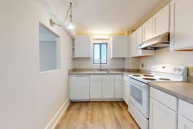 47 Mystic St Unit 4E, Arlington, MA 02474 - kitchen with white appliances, under cabinet range hood, white cabinetry, light wood-style flooring, and a textured ceiling