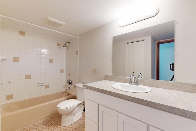 47 Mystic St Unit 4E, Arlington, MA 02474 - bathroom with toilet, shower / bathtub combination, vanity, tile patterned flooring, and a wall mounted AC