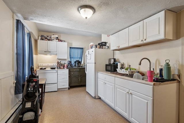 kitchen featuring sink, white cabinetry, a textured ceiling, a baseboard radiator, and white appliances