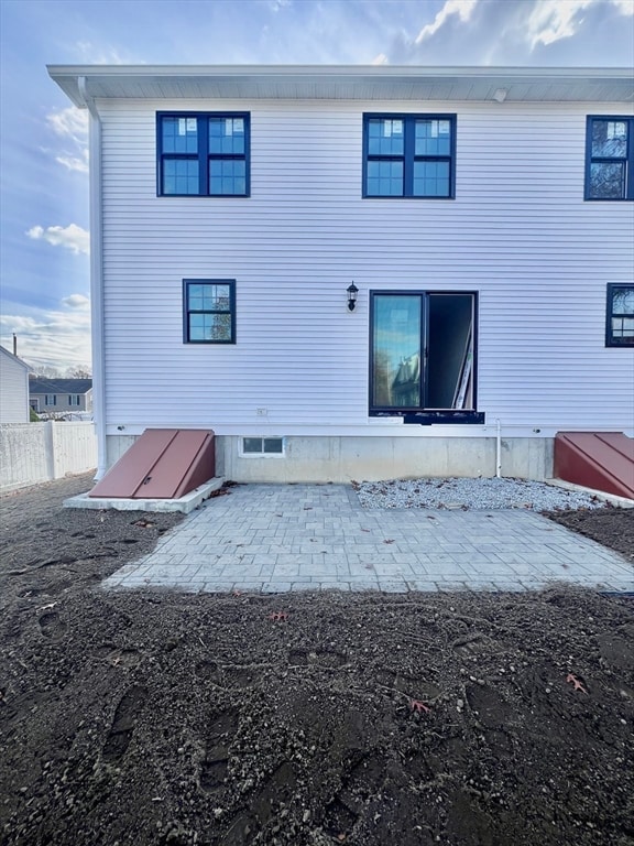 rear view of house featuring a patio area