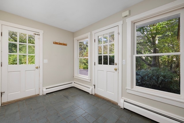 doorway featuring a baseboard heating unit