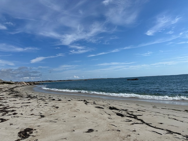 property view of water featuring a beach view