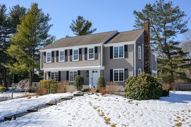 view of front of home with a chimney