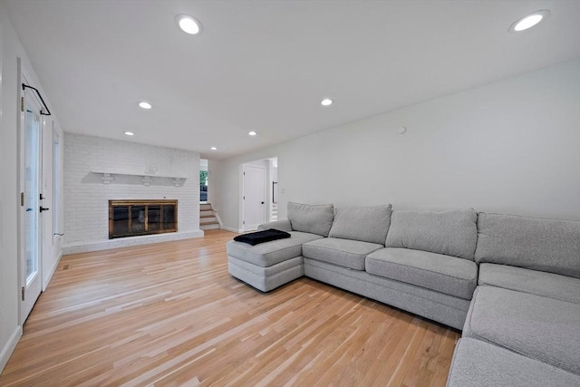 7 Helen Rd, Braintree, MA 02184 - living area with light wood-style flooring, a fireplace, and recessed lighting