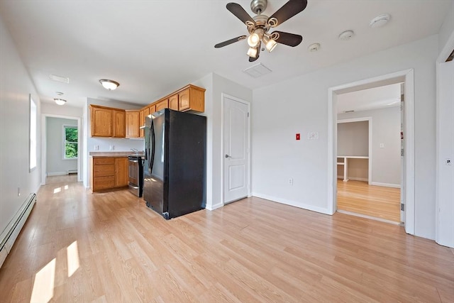 7 Helen Rd, Braintree, MA 02184 - kitchen featuring freestanding refrigerator, a baseboard heating unit, light wood-style floors, ceiling fan, and stainless steel electric range