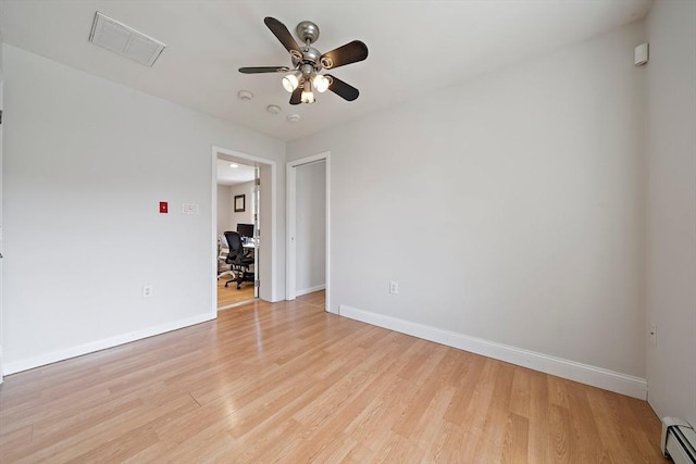7 Helen Rd, Braintree, MA 02184 - unfurnished room with a ceiling fan, a desk, baseboard heating, and light wood-style flooring
