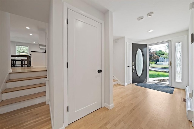 7 Helen Rd, Braintree, MA 02184 - foyer with stairs, light wood finished floors, and recessed lighting