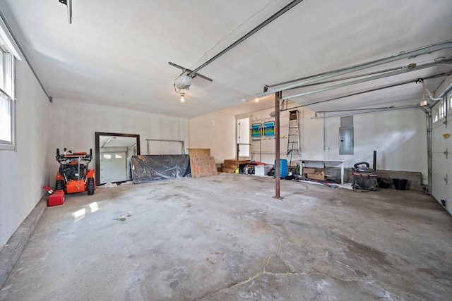 7 Helen Rd, Braintree, MA 02184 - garage with electric panel and a garage door opener
