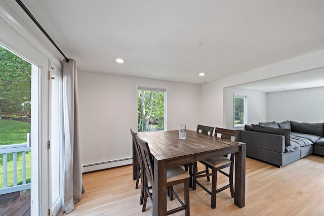7 Helen Rd, Braintree, MA 02184 - dining area with a baseboard heating unit, light wood finished floors, and recessed lighting