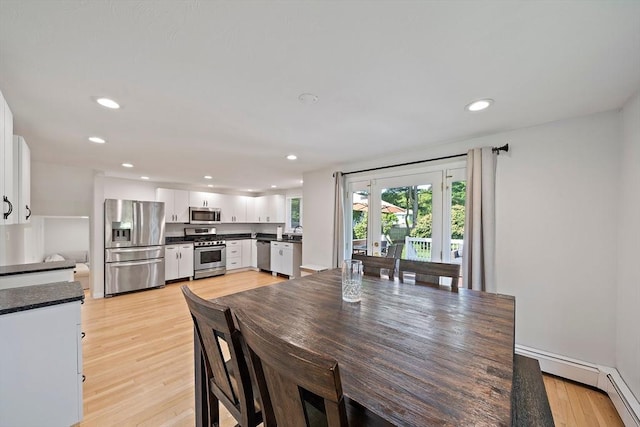 7 Helen Rd, Braintree, MA 02184 - dining area featuring light wood-style flooring, recessed lighting, and a baseboard heating unit
