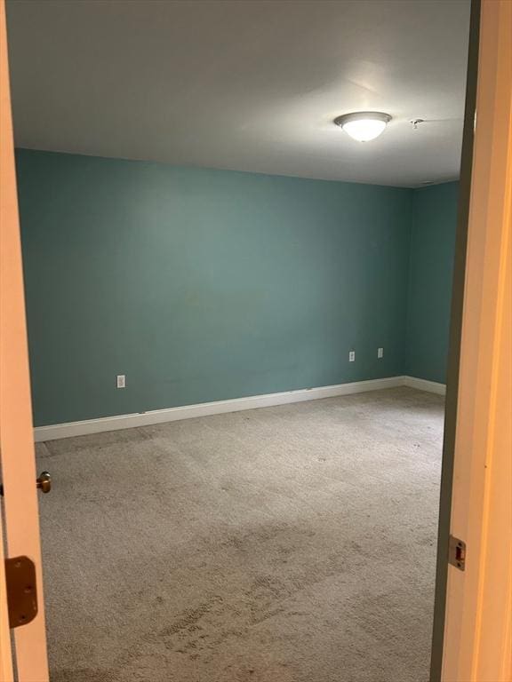 unfurnished room featuring carpet floors