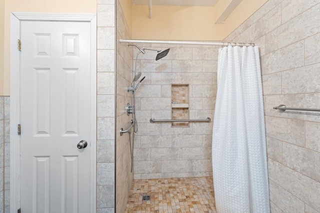 full bathroom with a shower stall