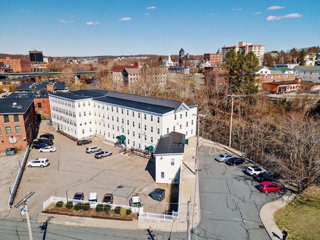 birds eye view of property with a city view